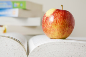 Books and apple